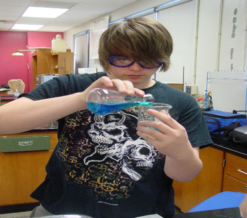 Nick M. measures the correct amout of Copper II Chloride